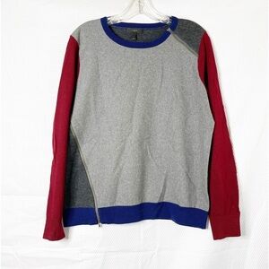 J Crew Asymmetrical side zip color block women size large Merino wool sweater.
